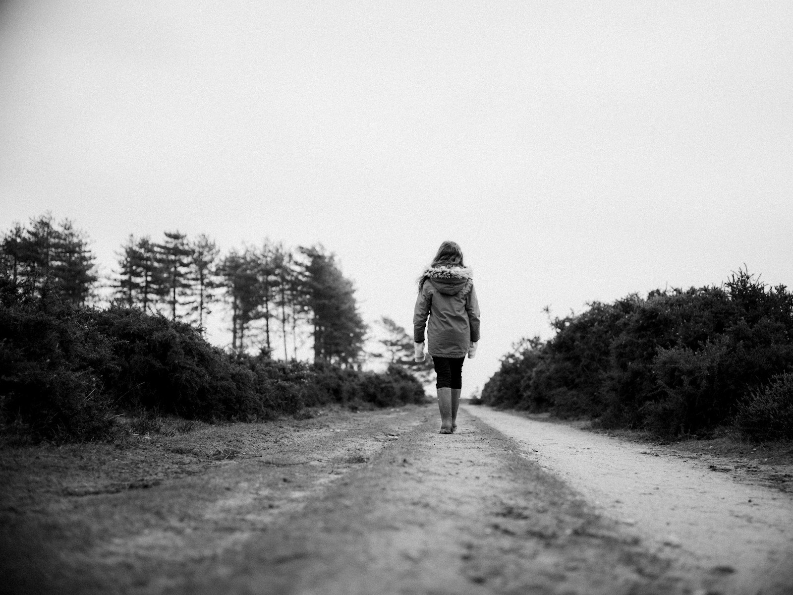 woman walking on road